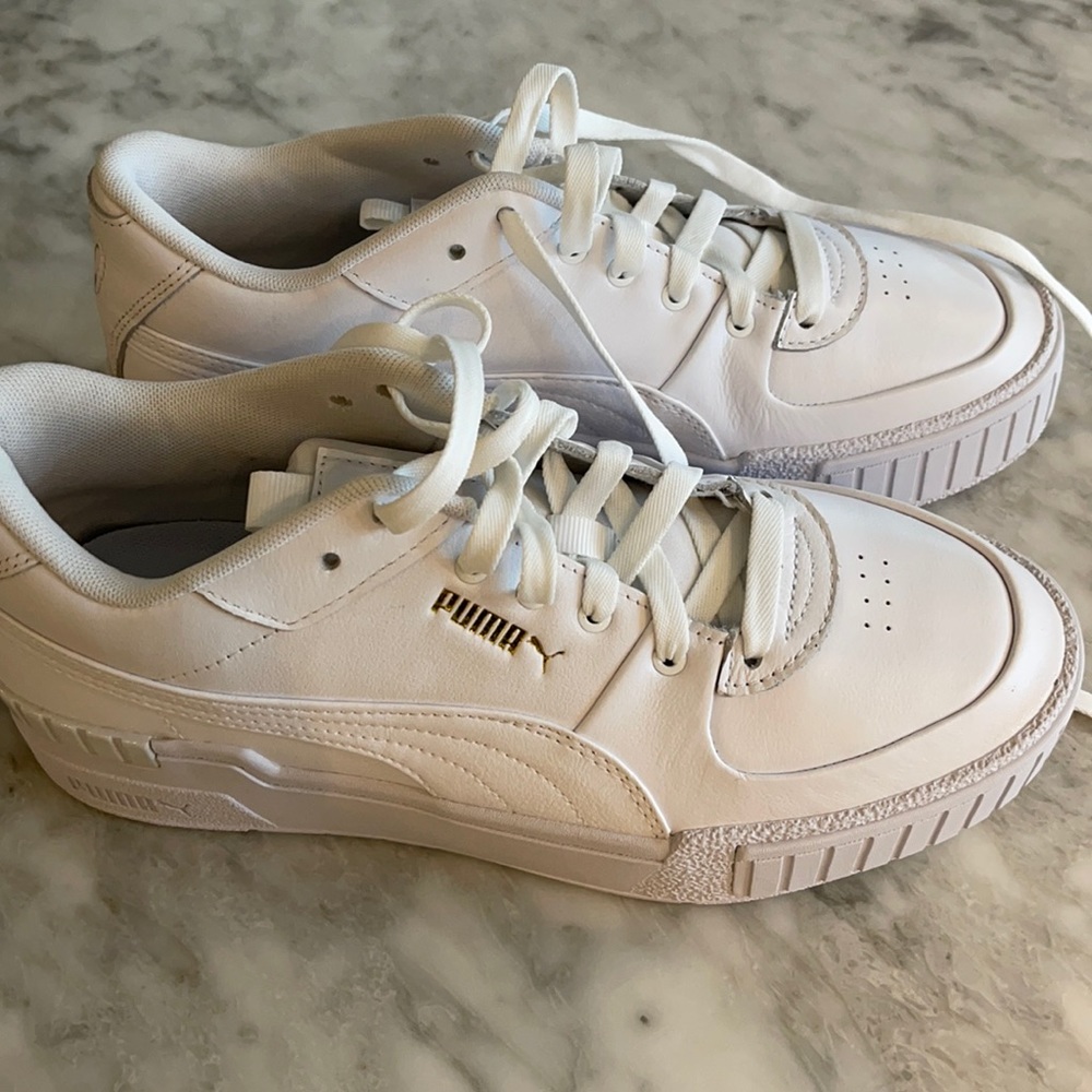 Brand  new white puma sneakers
